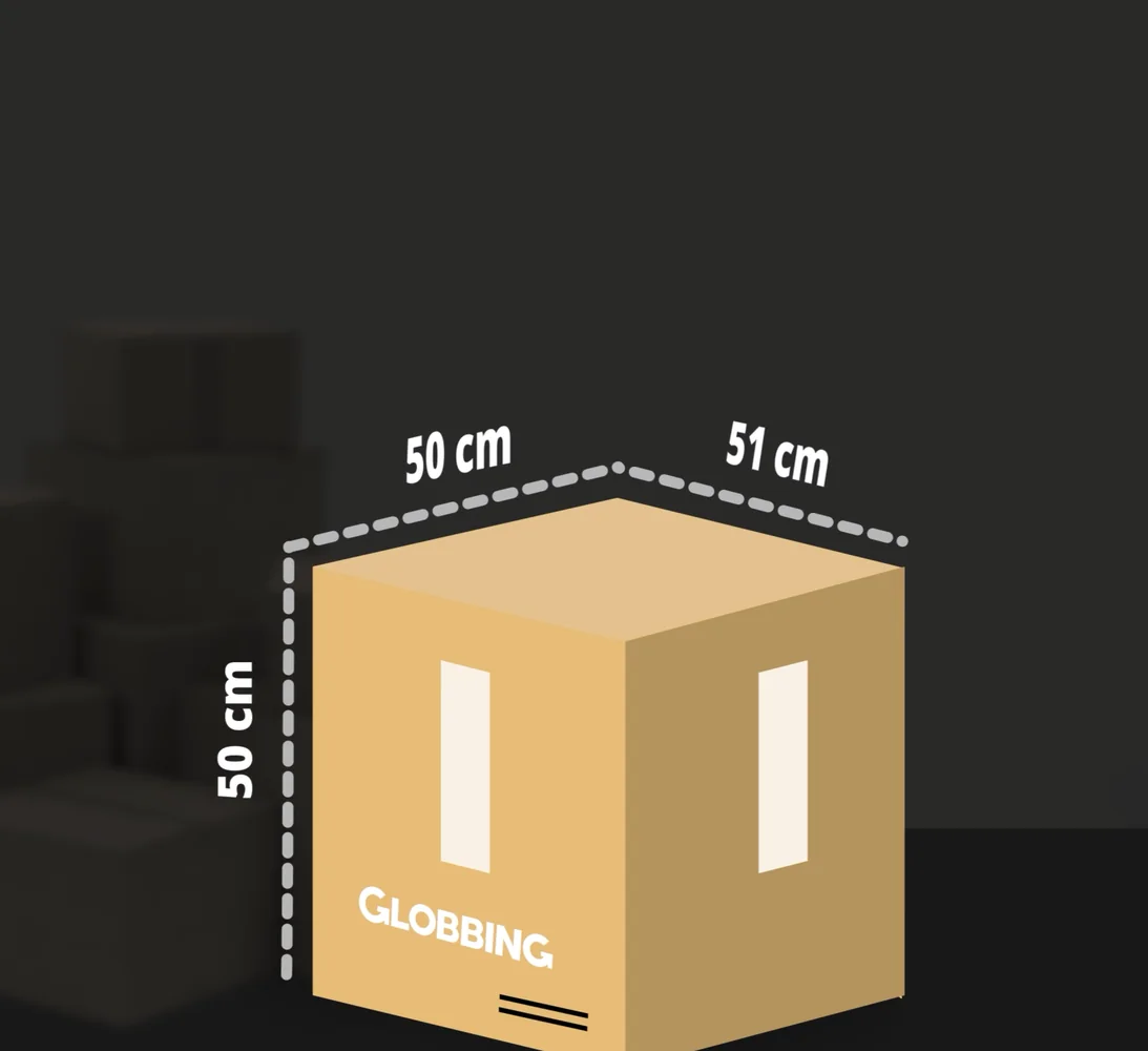An oversized box with its sides measured on a dark warehouse background